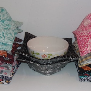 Bowl Cozy Microwave/Reversible - set of 2. Bowl Cozy Microwave, Reversible, Washable - set of 2. Fits bowls measuring up to 6.5&quot;– 7&quot; W