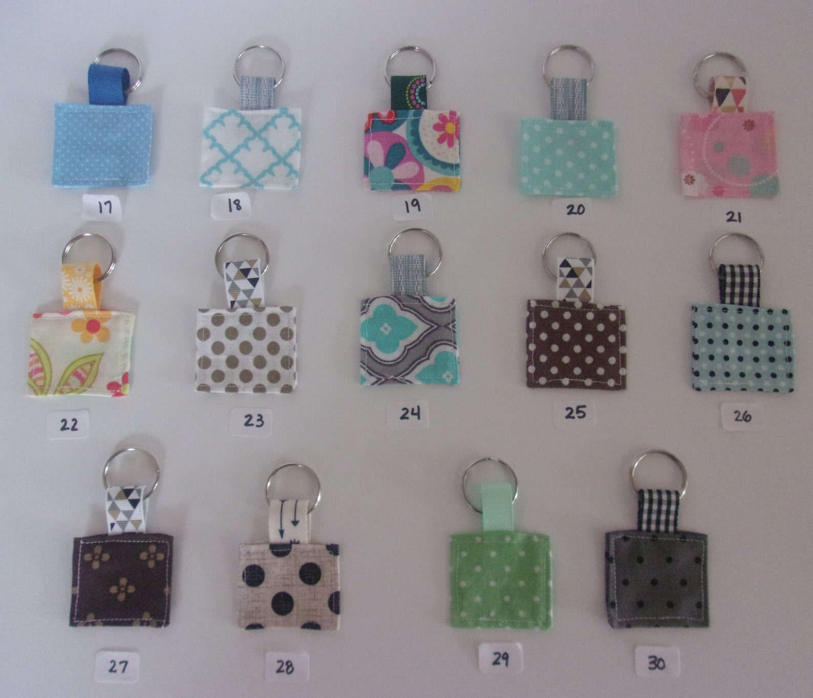 Mini Square Fabric Keychains With Ribbon Tab and Key Ring. 1 3/4