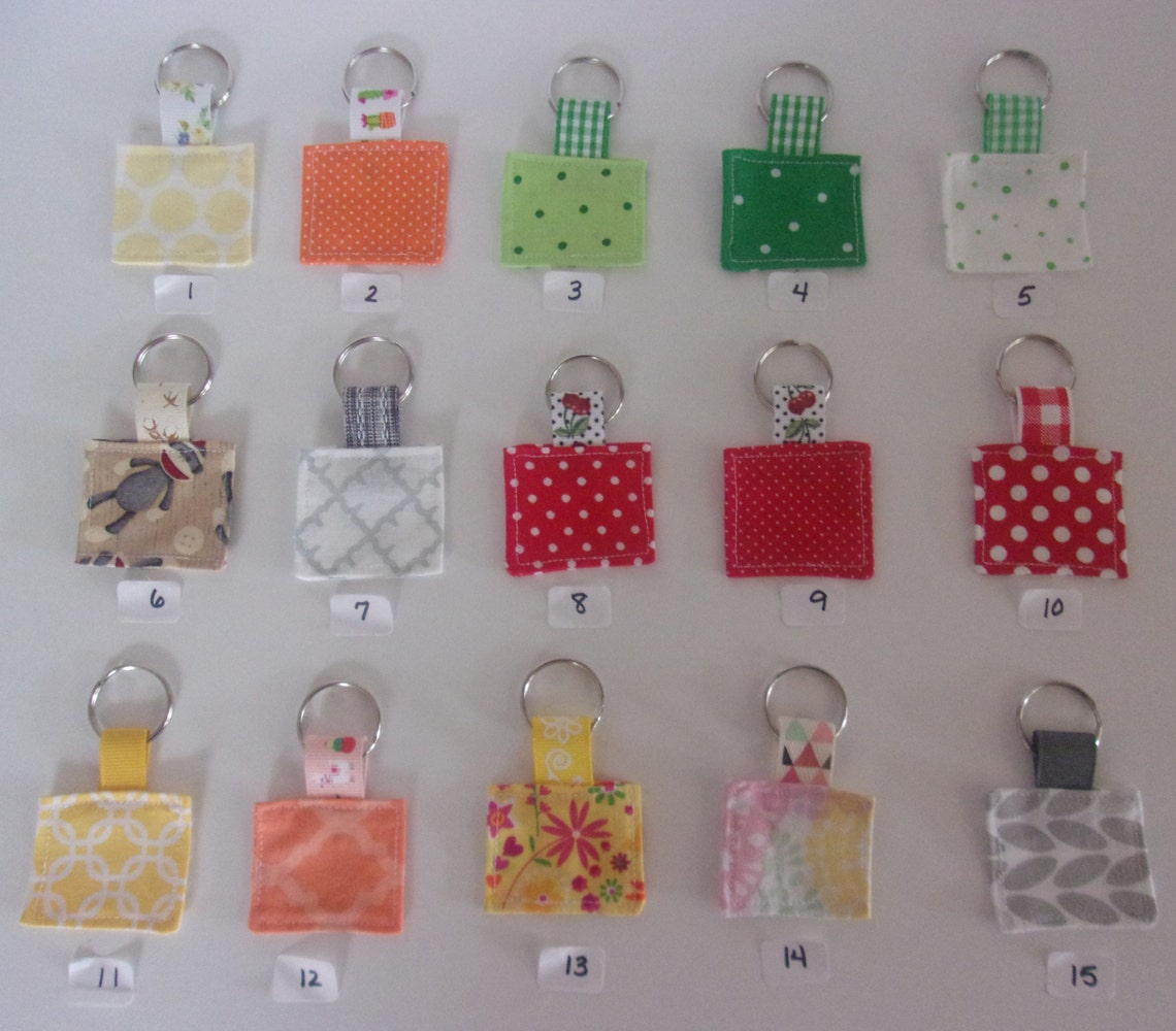 Mini Square Fabric Keychains With Ribbon Tab and Key Ring. 1 3/4