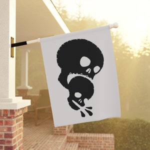 Skull Eating Another Skull Pirate Flag