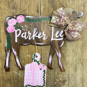 Cow baby door hanger