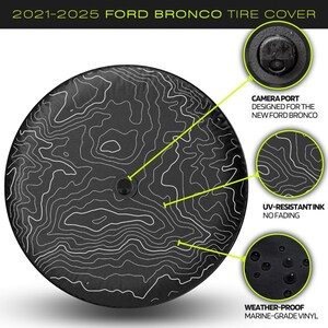 Custom Ford Bronco tire cover with backup camera port, designed for 2021-2025 models, weatherproof and UV-resistant. Perfect accessory for Ford Bronco owners, available in multiple colors and designs