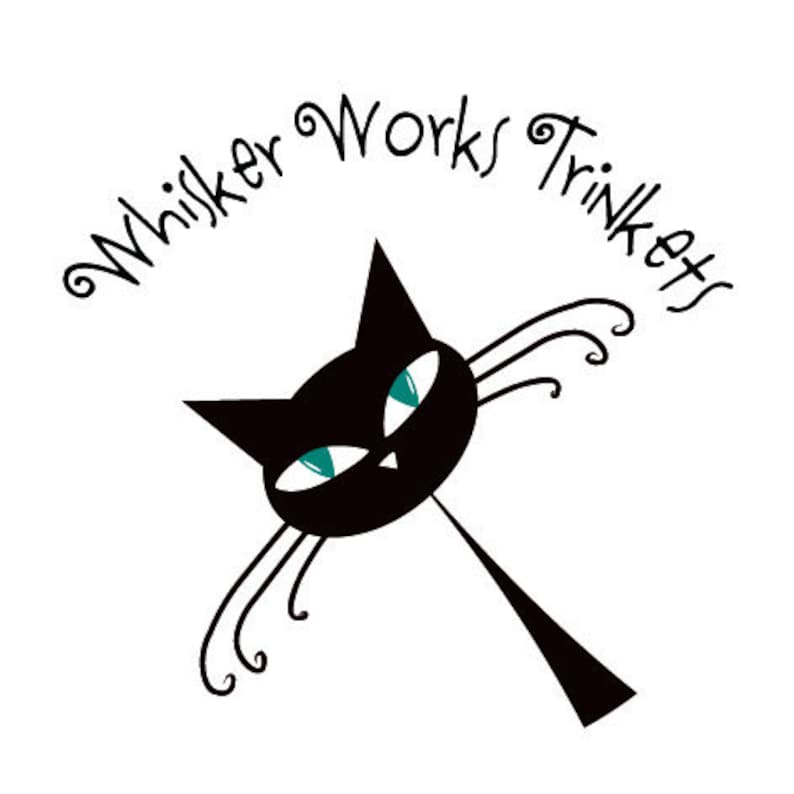 May include: Black cat silhouette with teal eyes and a whimsical design. The text "Whisker Works Trinkets" is written in a cursive font around the cat.