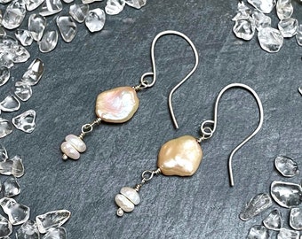 Eleganti orecchini di perle color champagne con ago d