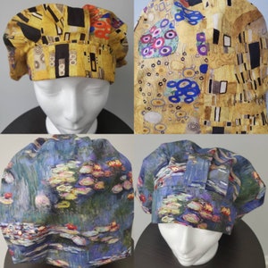 May include: A set of four chef hats featuring famous art prints. Two hats display a gold and brown abstract design, while the other two showcase a blue and green water lily painting. The hats are on a white mannequin head.