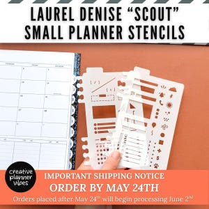 May include: White plastic planner stencils with various shapes and icons, including lines, boxes, and symbols. The stencils are held next to an open planner with calendar pages. The text "LAUREL DENISE 'SCOUT' SMALL PLANNER STENCILS" is at the top.