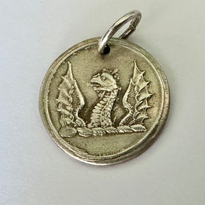 new reproduction dragon or griffin charm/pendant, 960 silver