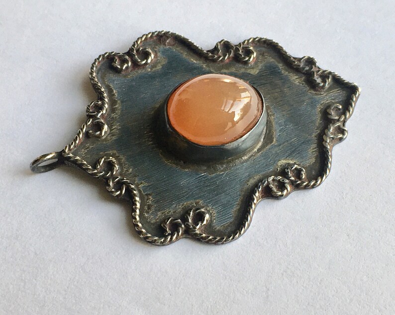 vintage southwestern silver and peach moonstone pendant
