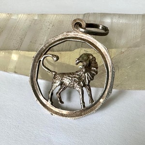 vintage sterling lion pendant