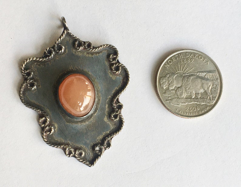 vintage southwestern silver and peach moonstone pendant