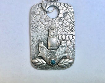 new:  a sterling owl tag with a bit of turquoise