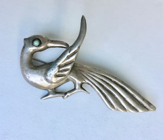 vintage Mexican bird brooch with turquoise eye - image 1
