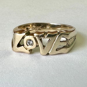 vintage 10k gold LOVE band with diamond, size 7