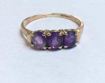 three stone amethyst ring in 9k gold, size 6.5