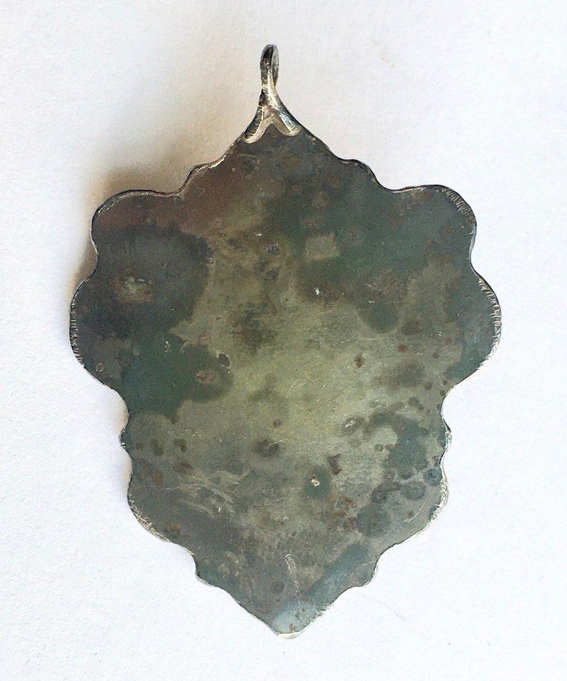 vintage southwestern silver and peach moonstone pendant