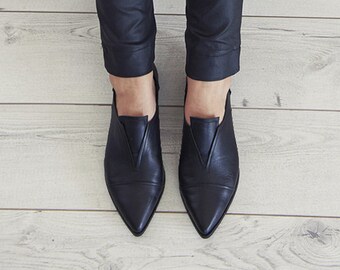 pointed toe slip on