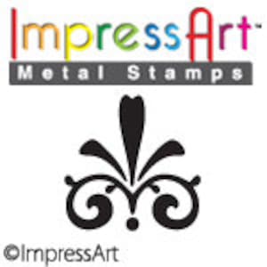 May include: Black metal stamp with a decorative design featuring a stylized floral motif. The design is symmetrical and features a central point with two curved lines extending out on either side. The stamp is for use in crafting and scrapbooking.