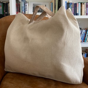 Extra large tote bag with vegan leather handles.