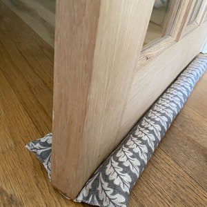 double under door draught excluder, double sided door draft stopper uk, door sausage, draught stopper, door air noise blocker, noise stopper acorn