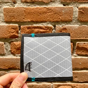 Cartera de vela reciclada