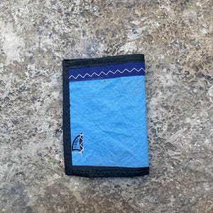 Mini billetera de vela reciclada