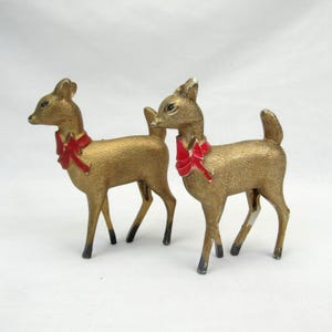 Vintage 1950s Deer Figurines hard plastic Gold 3.5&quot; with Christmas bows