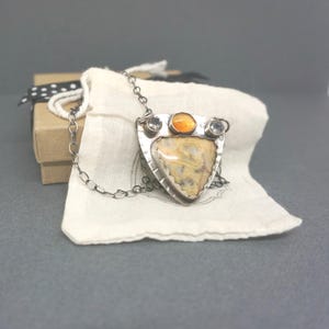 Crazy Lace Agate Pendant with quartz and carnelian: Oxidized Sterling Silver, triangle pendant