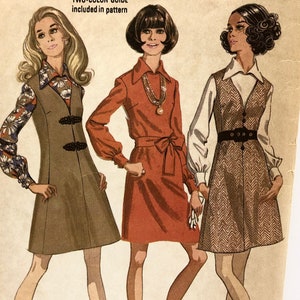May include: Vintage McCall's sewing pattern for a dress, blouse, and jumper. The pattern is for misses' sizes 10-32 1/2 and is labeled "New Easy" with a two-color guide included. The pattern features three women wearing the different styles.