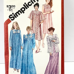 May include: Simplicity sewing pattern number 5330 for a small size 10-12 miss. The pattern includes five different styles of nightgowns and a robe. The nightgowns are in various colors and patterns, including blue, pink, and white. The robe is white with a lace trim.