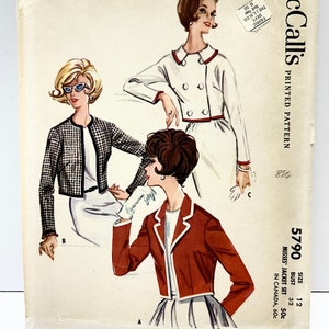 May include: A vintage McCall's sewing pattern for a misses' jacket set. The pattern is for size 12, bust 32. The pattern shows three different styles of jackets, one in black and white gingham, one in white with red trim, and one in red with white trim. The pattern is printed on a white background with black text. The text on the pattern reads "McCall's Printed Pattern 5790 Size 12 Bust 32 Misses' Jacket Set 50c In Canada 60c".