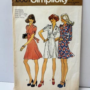 May include: Vintage Simplicity sewing pattern 6661 featuring illustrations of three dresses. The pattern includes two sizes, bust measurements of 34 and 35 inches, and is for Junior Petite sizes. The cover is tan with brown text.
