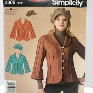 May include: Simplicity sewing pattern number 2808 for a jacket with a collar and buttons. The pattern includes two different styles of jackets, one with a more fitted look and the other with a more relaxed look. The pattern also includes instructions for making a hat.
