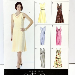 May include: A sewing pattern for a dress with six different style options. The pattern is called Vogue Easy Options V8068 and includes sizes 12-14-16.