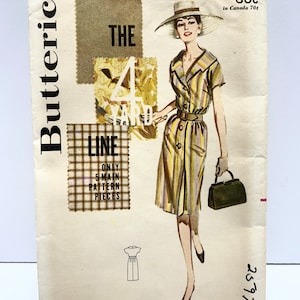 May include: Vintage sewing pattern for a dress, Butterick pattern number 2597, size 16, bust 36. The pattern is for a dress with a collar, short sleeves, and a belt. The pattern is illustrated with a woman wearing the dress and a hat.
