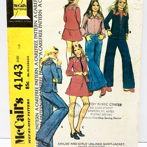 May include: Vintage McCall's sewing pattern 4143 for children's and girls' unlined shirt-jacket, skirt, and trousers. The pattern features illustrations of various outfits, including a red skirt suit and a denim trouser suit. The pattern size is 12.