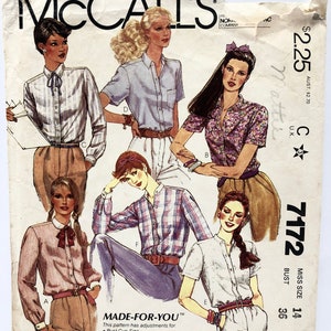 May include: A vintage McCall's sewing pattern for a women's blouse. The pattern is for size 14, bust 36. The pattern includes instructions for making a variety of styles, including a plaid shirt, a floral print shirt, and a solid color shirt. The pattern is titled "Made-For-You" and includes adjustments for bust cup size.