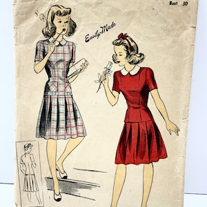 May include: Vintage sewing pattern for a dress with a Peter Pan collar. The pattern is for size 12 with a bust measurement of 30 inches. The pattern is from Du Barry Patterns Ltd. and is dated 1943. The pattern includes instructions for making a plaid dress and a solid red dress.
