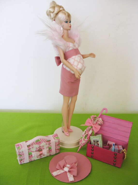 Barbie with pregnant belly