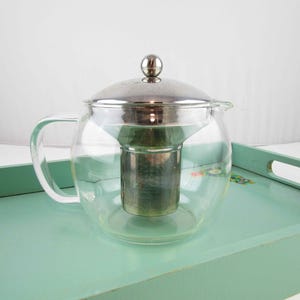 A Glass Teapot With Loose-leaf Diffuser/Filter - Stainless and Glass - Three Cup Teapot - Stylish and Usable Glass Teapot