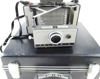 Vintage Polaroid Camera Kit - Model 230 - Hard Plastic 'Coast' Carry Case - Timer, Portrait Setup, Filters, Flash Unit - Manuals, Etc.