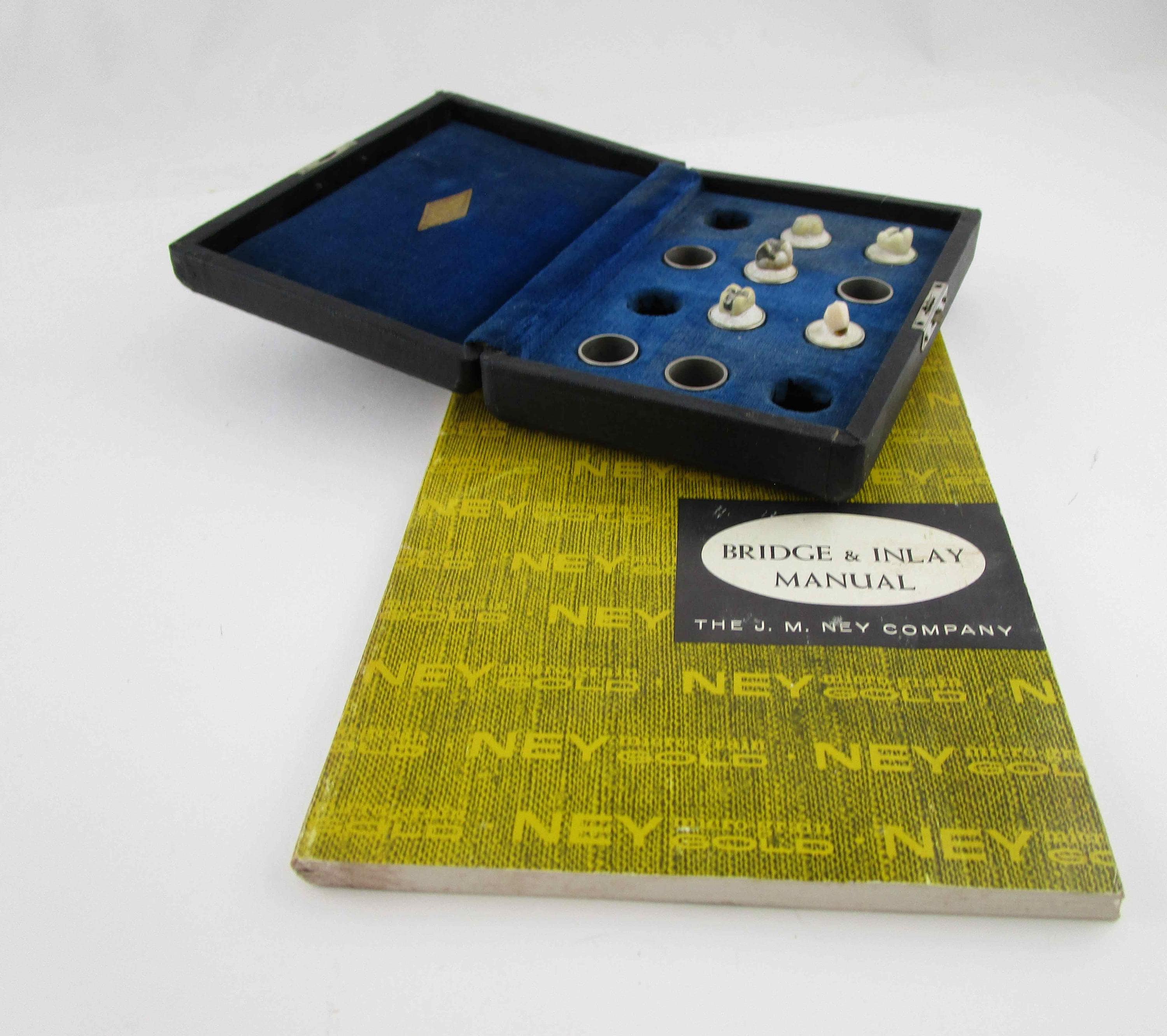 Vintage Porcelain Teeth Set: Clev-dent Case & 1962 Dental Manual