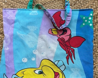 Handmade upcycled Little Mermaid Flounder and Sebastian 1980s bedsheet tote bag. Lined.