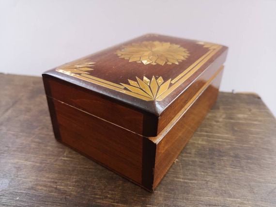 A genuine Latvian Soviet-era wooden box inlaid with real Baltic amber — you simply cannot find this at Target.