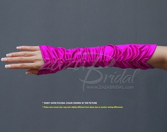 May include: A pair of long, fuchsia satin gloves. The gloves are gathered at the wrist and have a shiny finish.