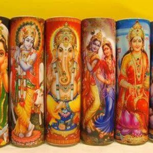 May include: Set of ten colorful candles featuring Hindu deities. Each candle depicts a different god or goddess, including Ganesha, Shiva, and Vishnu. The candles are approximately 4 inches tall and are made of wax.