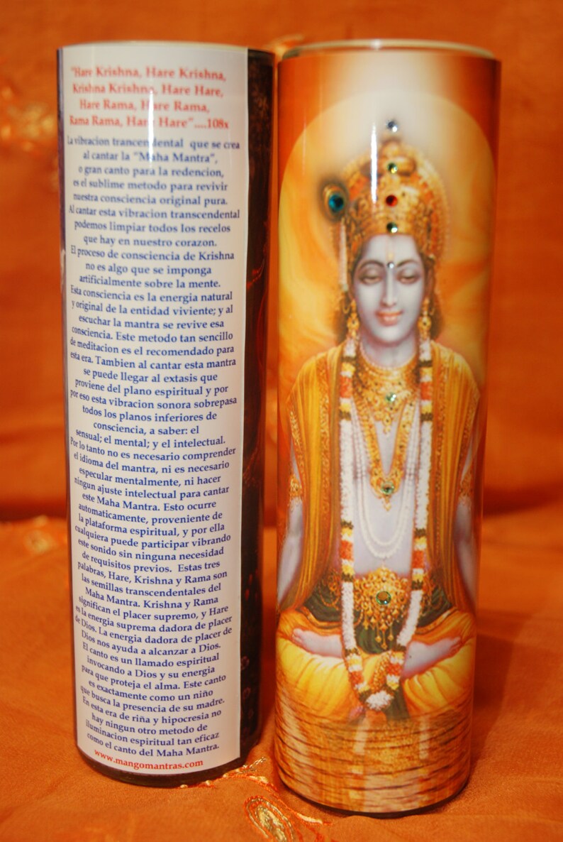May include: A colorful candle with a picture of Krishna, a Hindu deity, on the front. The candle has text on the side that reads "Hare Krishna, Hare Krishna, Krishna Krishna, Hare Hare, Hare Rama, Hare Rama, Rama Rama, Hare Hare."