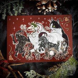May include: A red background with a white cat with black markings, a white creature with a skull face and a wreath of leaves, and several black creatures with horns and tails. The creatures are dancing around the white cat and the white creature. The background is covered in white stars.
