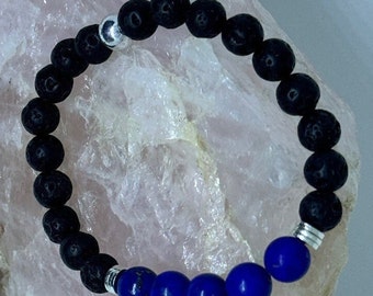 Lapis Lazuli & Lava Bead Stretch Bracelet with Silver Spacers and Silver Bead. (Strength, Courage, Royalty, Honor, Spirit, Vision)