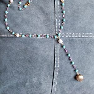 rosary style necklace with turquoise glass beads, tiny amethyst squares, freshwater pearls and round gold plated pendant, lariat necklace