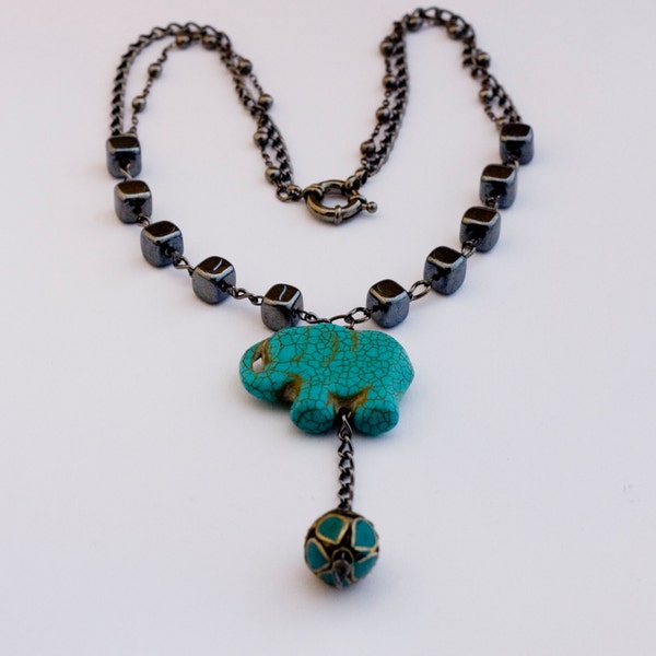 gunmetal chain necklace with big turquoise elephant pendant and hematite square beads